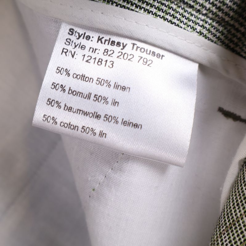 Materialetikett visar 50% bomull 50% linne