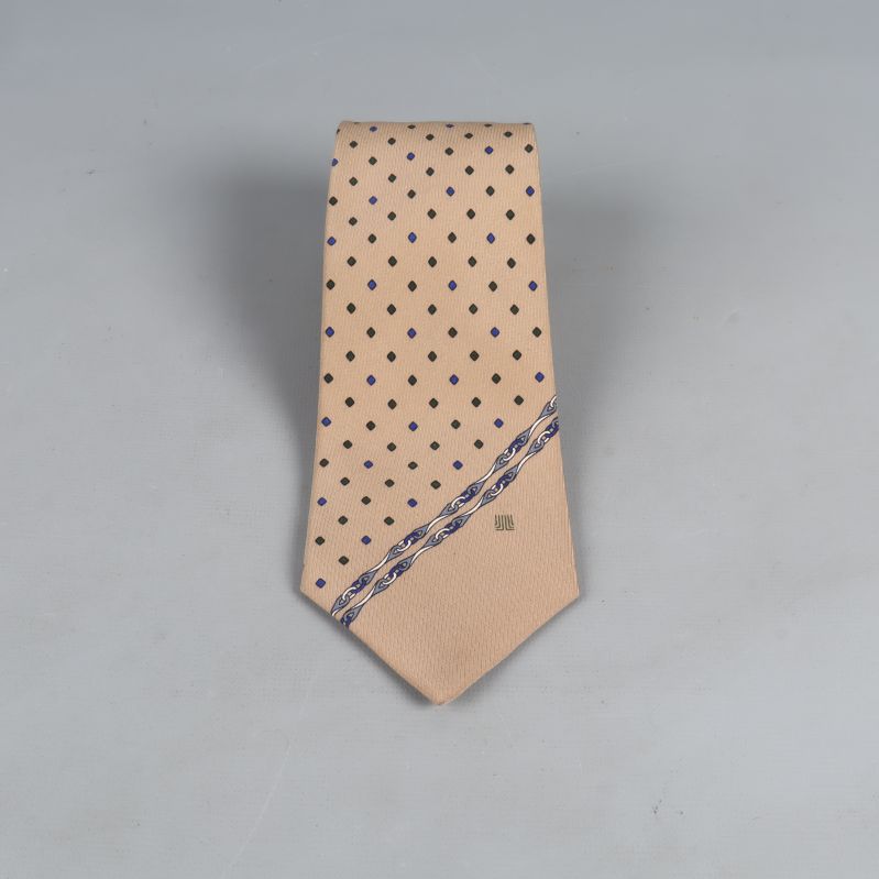 Beige slips med svarta och blå prickar