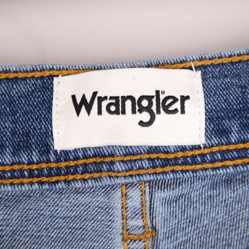 Wrangler logotyp på jeanslinning