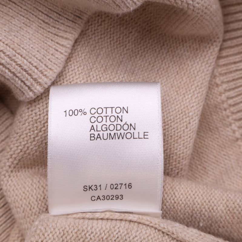 Materialetikett med 100% Cotton