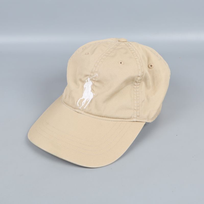 Beige keps med broderad logo fram