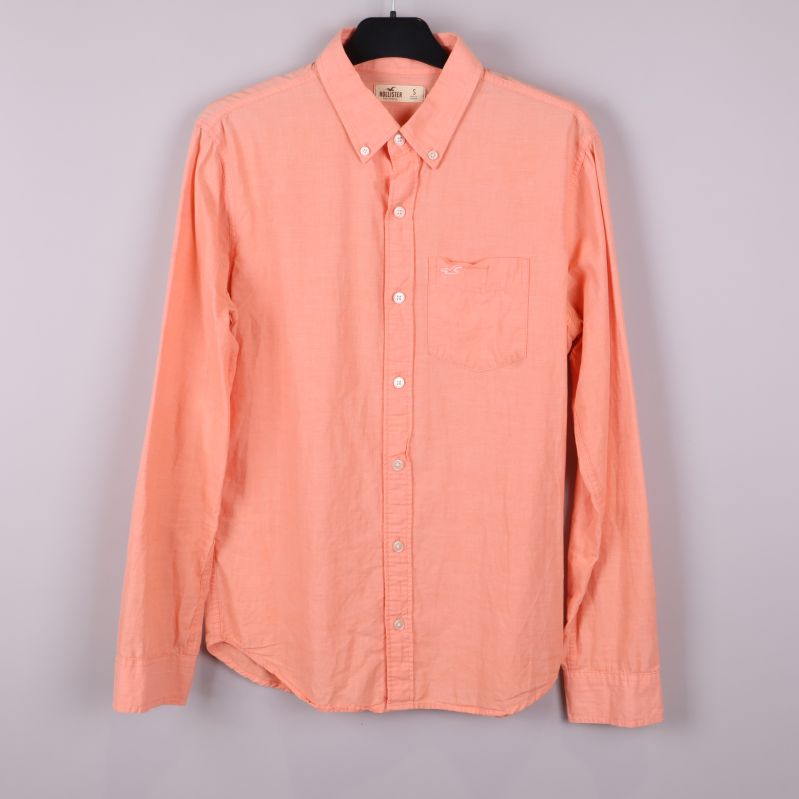 Aprikos skjorta med lång ärm och knappslå framtill