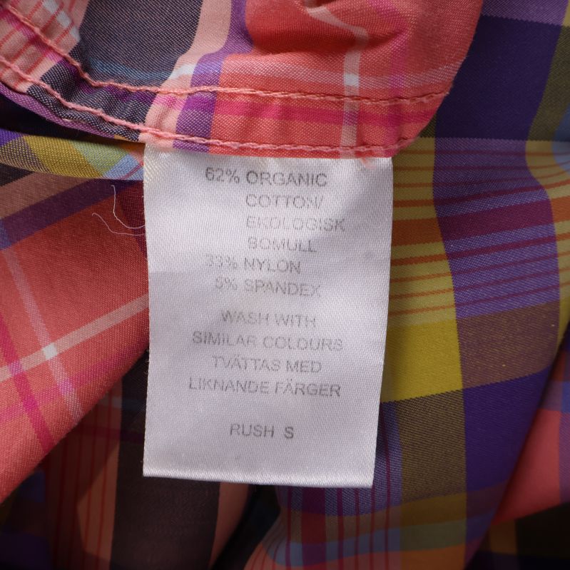 Materiallapp med info om bomull, nylon och spandex