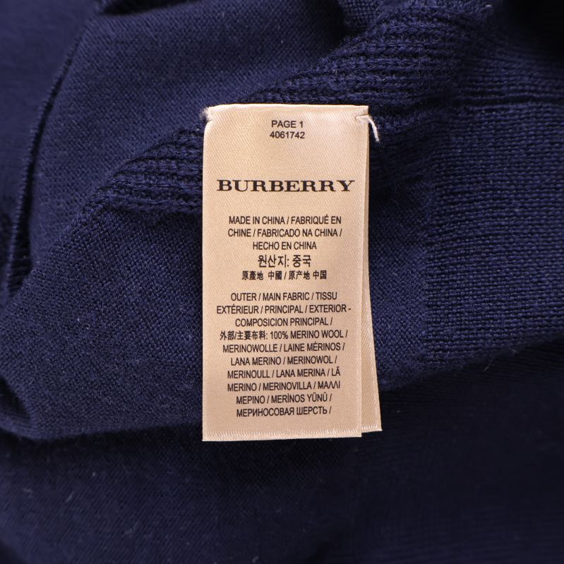 Materiallapp från Burberry med sammansättning och skötselråd