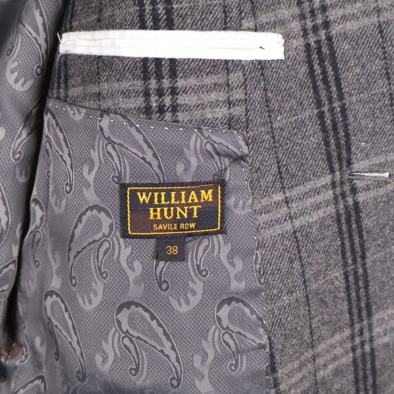 Detalj av innerficka med William Hunt-märke och paisleyfoder