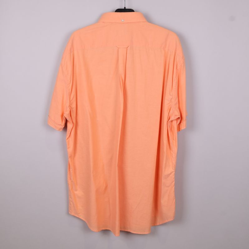 Kortärmad aprikos skjorta bakifrån