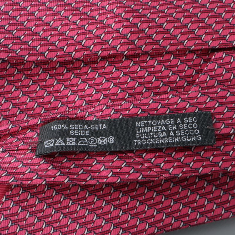 Materialetikett med 100% siden 