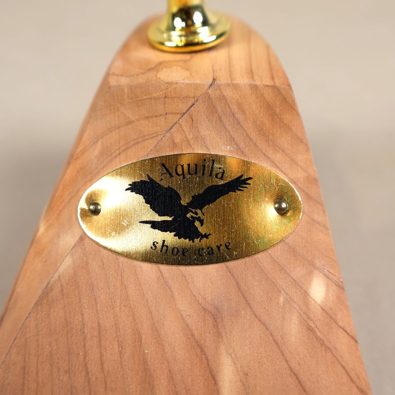 Närbild på Aquila-logga