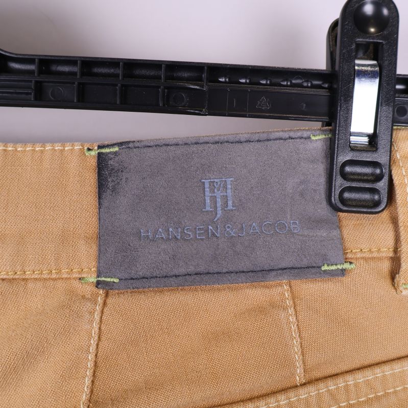 Närbild på sliten läderpatch