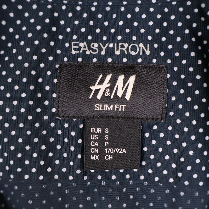 H&M slim fit label och Easy Iron-tryck