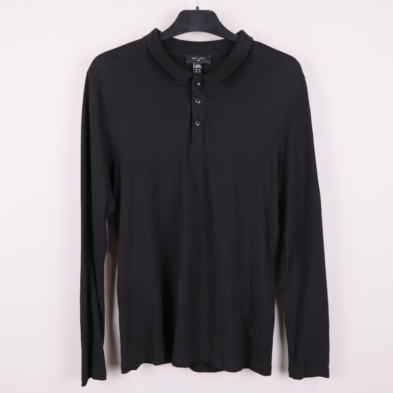 Svart långärmad pikétröja framifrån 