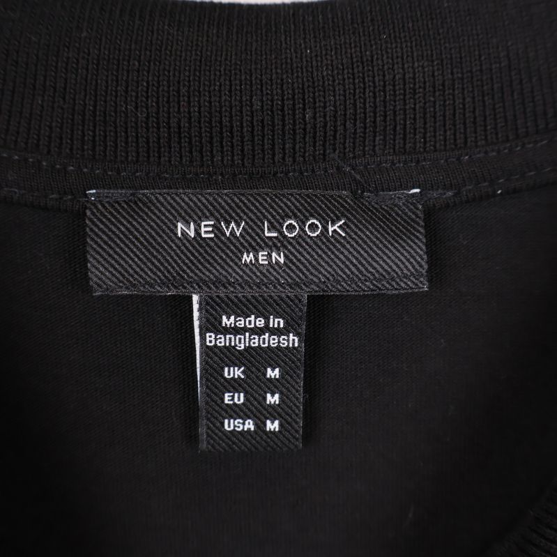 Närbild av New Look Men etikett i halsen