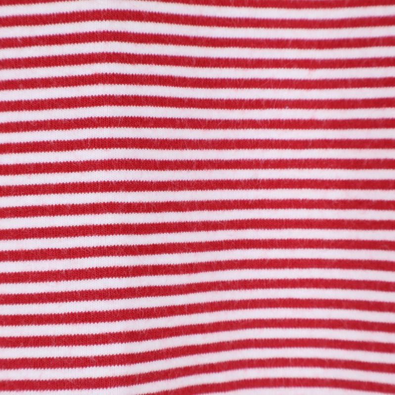 Närbild på det röda och vita randiga tyget
