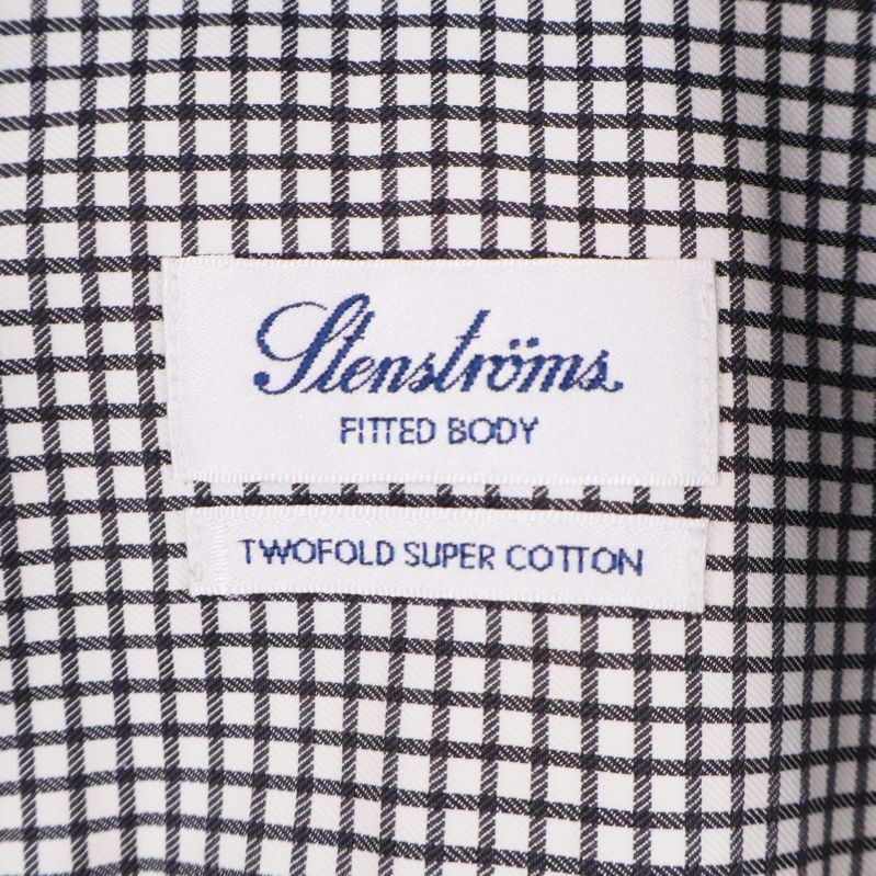 Närbild på etikett med Stenströms och tvåfalld bomull