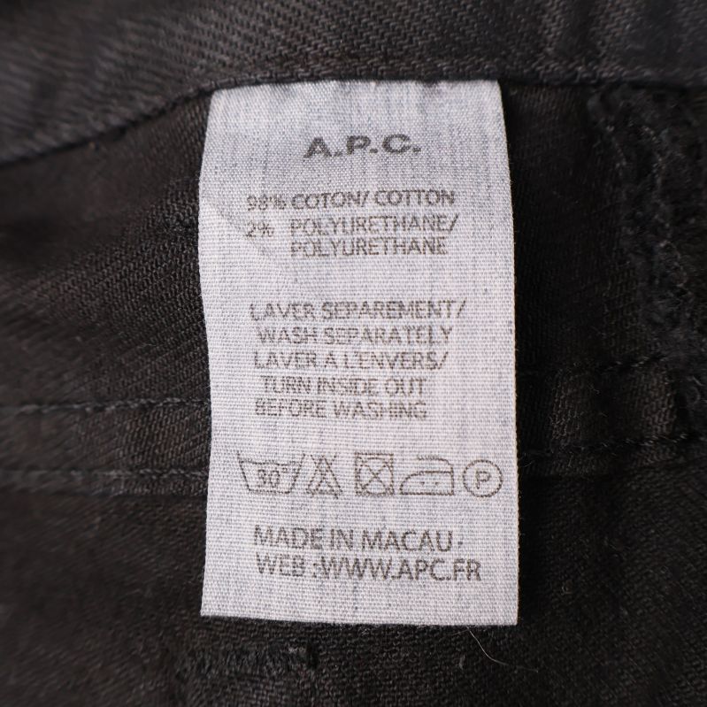 Materiallapp visar 98% bomull och 2% polyuretan