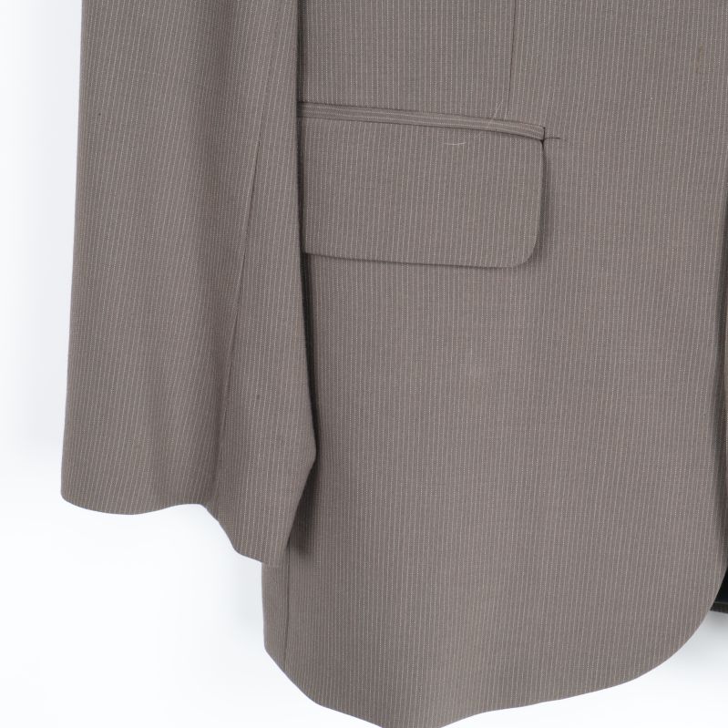 Närbild av undre ficka och tygstruktur