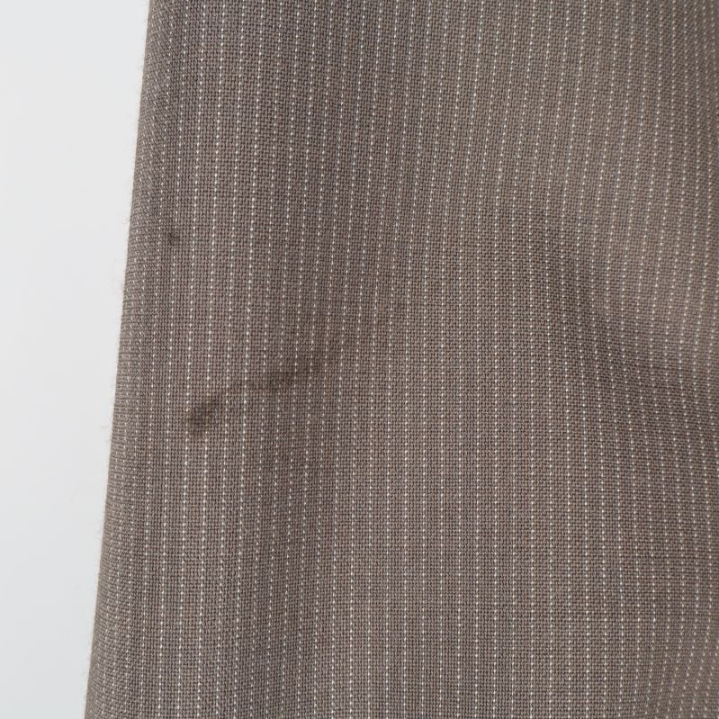 Fläck på vänster ärm av kavajen