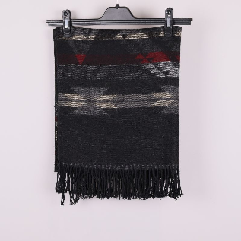 Halsduk vikt med fransar synliga och grafiskt mönster