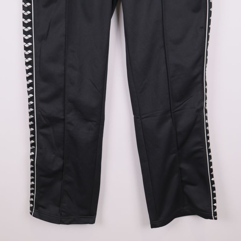 Ben och avslut på träningsbyxor med kontrasterande sidor