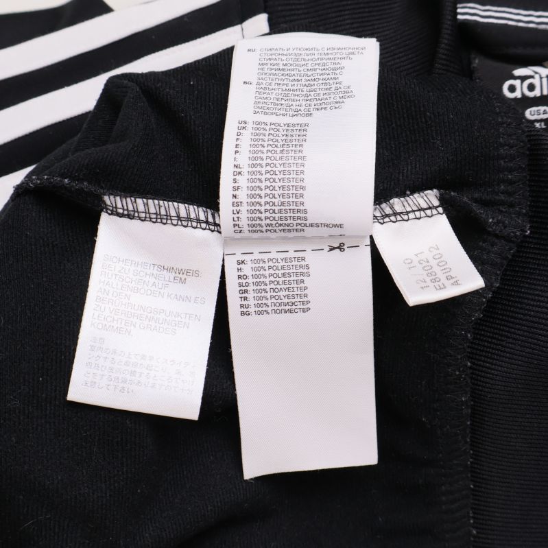 Material- och tvättrådsetikett i träningsjackan