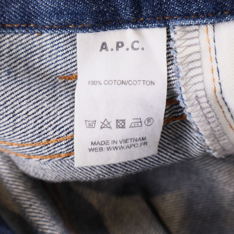 Materiallapp i jeans visar 100% bomull