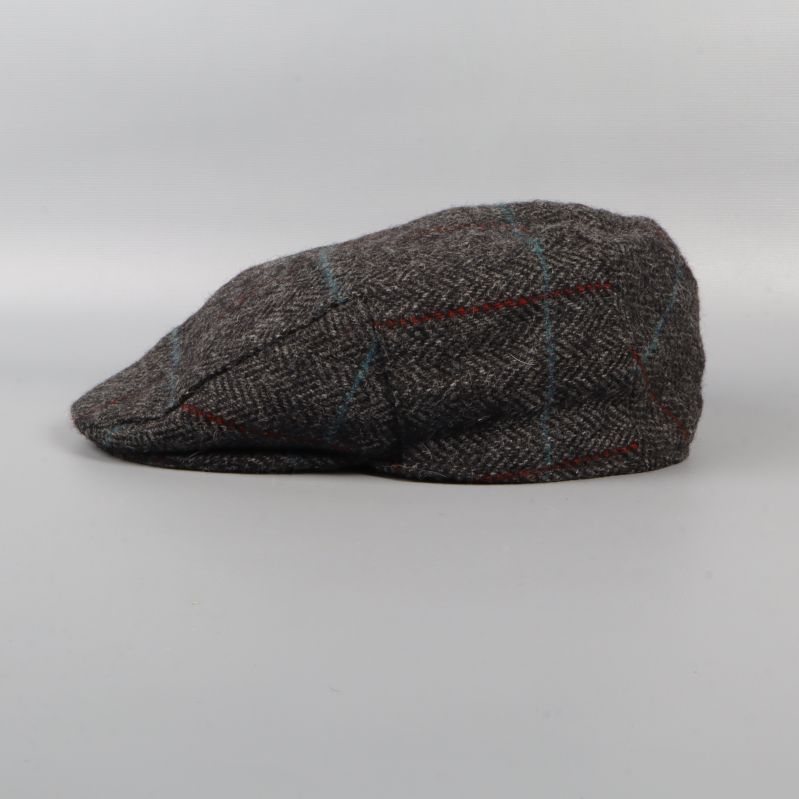 Flat cap sedd från sidan i profil