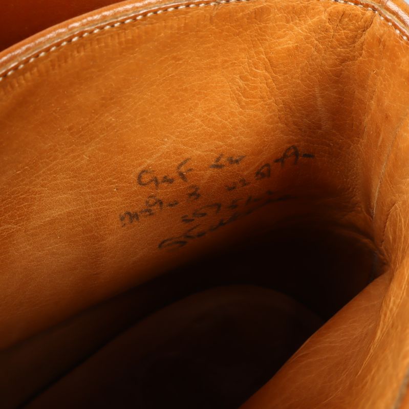 Handskriven märkning på insidan av boots