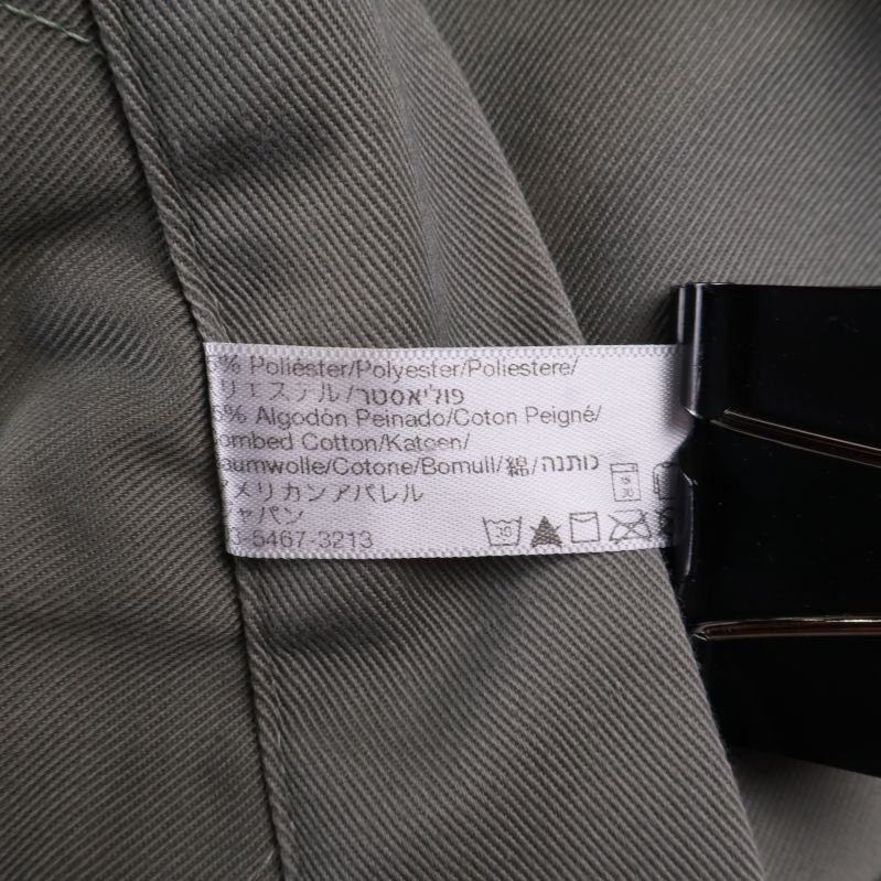 Materialetikett med information om bomull och polyester