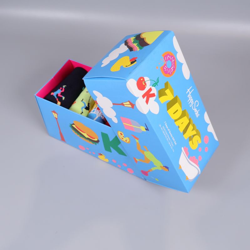 Blå ask till hälften öppen med text 7 DAYS