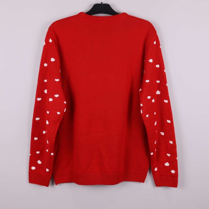 Baksidan av röd stickad tröja med vita prickar