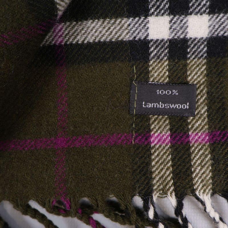 Materiallapp visar 100 procent lammull