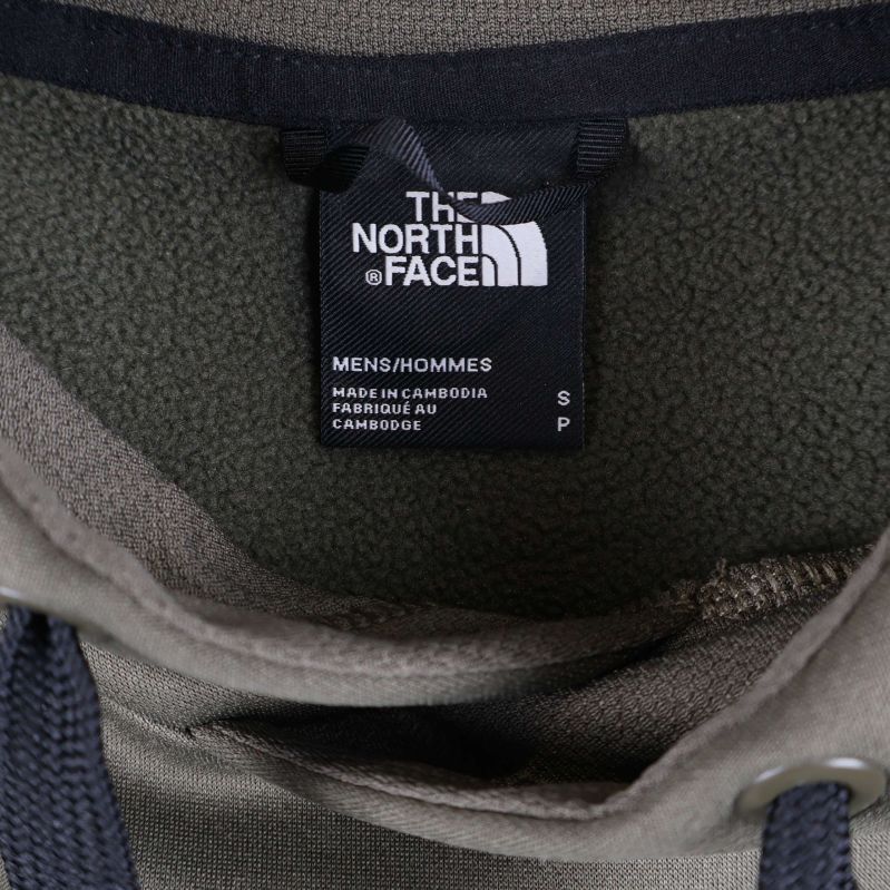 Nacketikett visar The North Face och storlek S