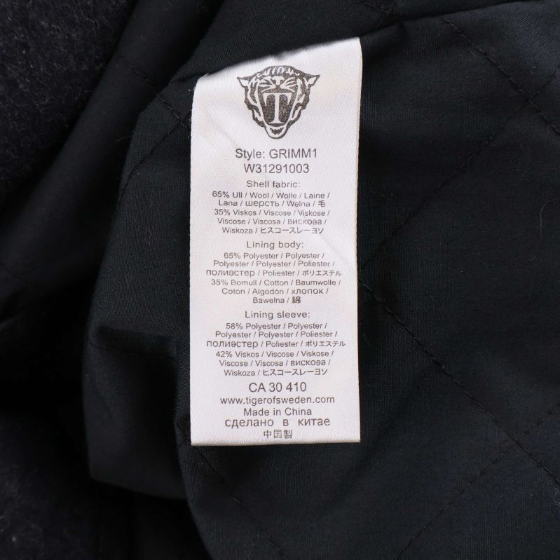 Tvättlapp med materialinformation och tillverkningsland