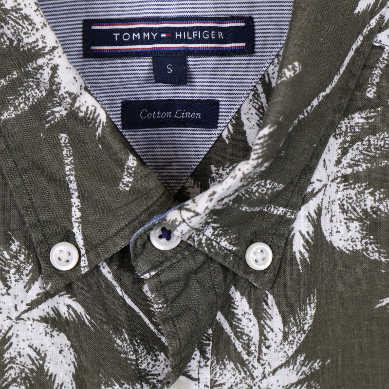 Detalj av bröstlogotyp