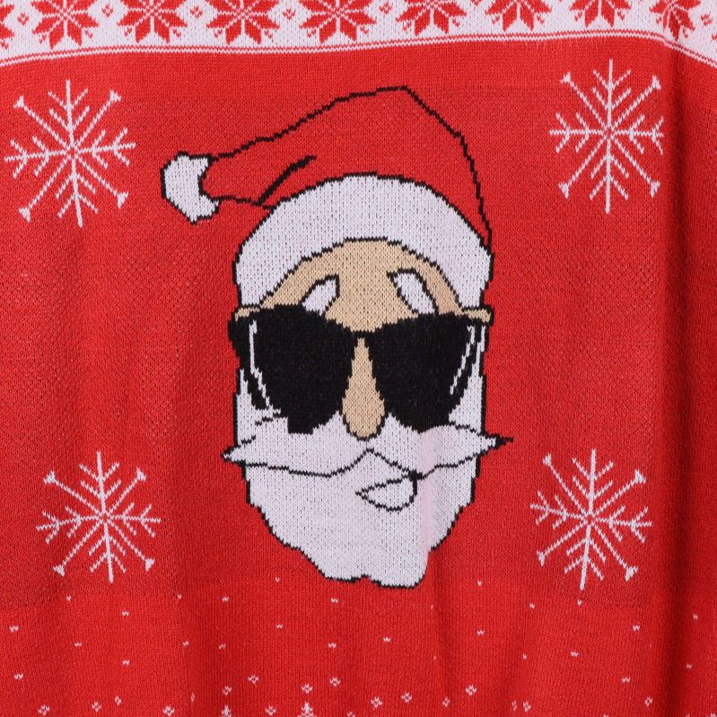 Närbild av jultomte med svarta solglasögon på röd tröja