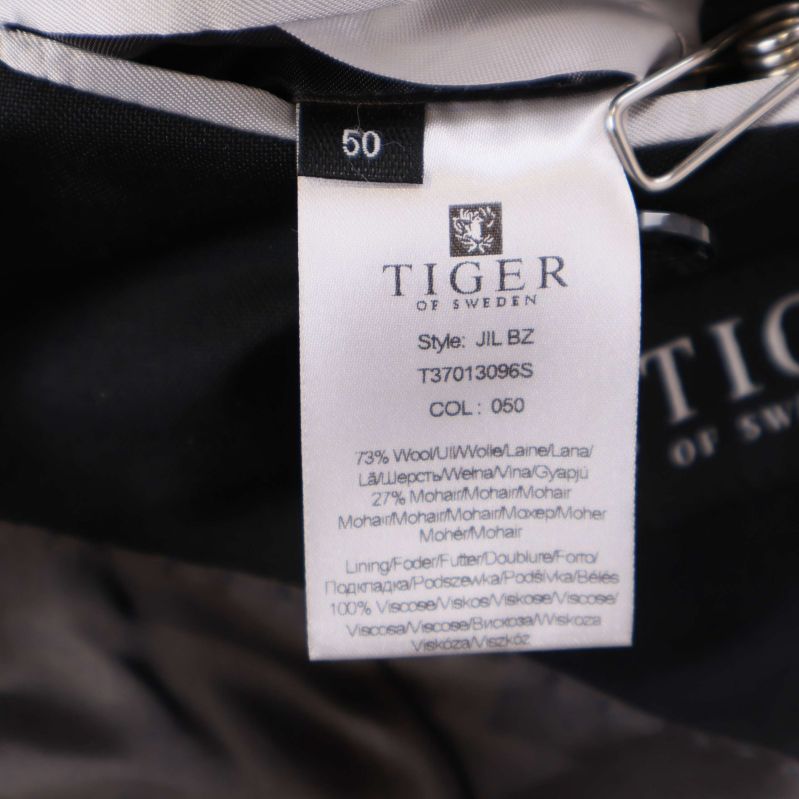 Materialetikett med sammansättning och storlek