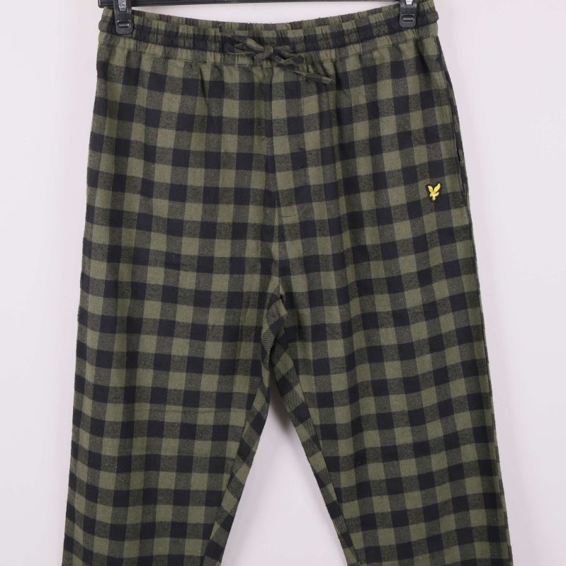 Rutiga pyjamasbyxor med broderad gul logga framtill