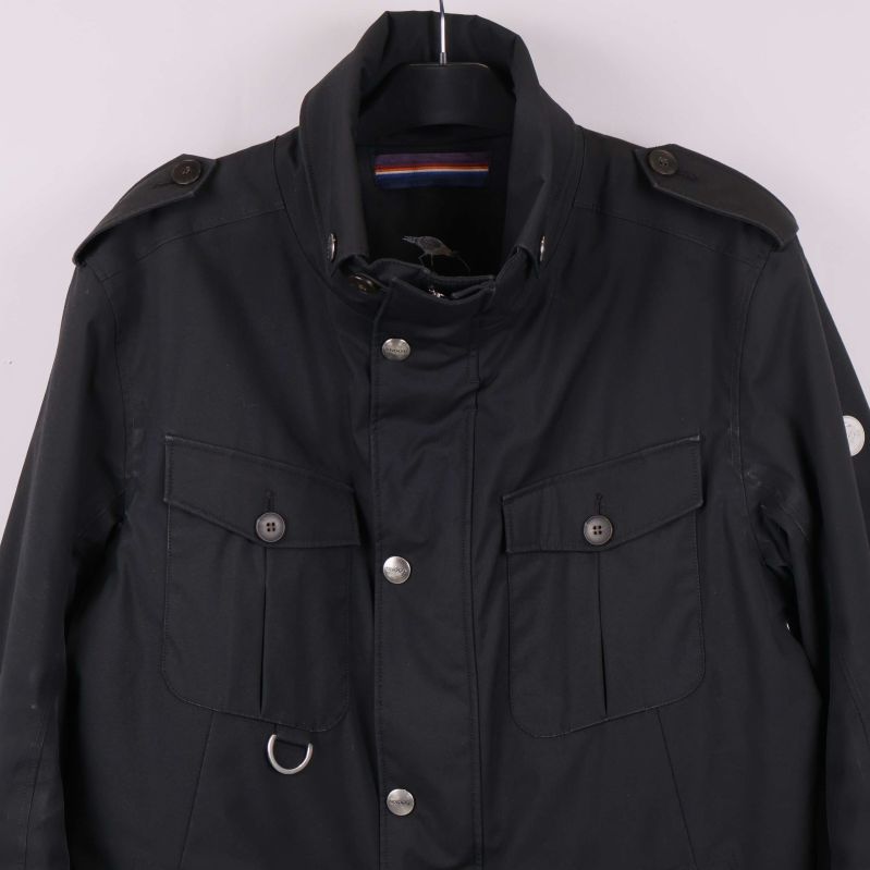 Övre delen av jacka med fickor och axelpartier