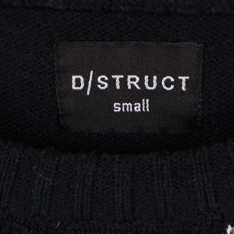 Textilögla med D/STRUCT small på insidan av kragen