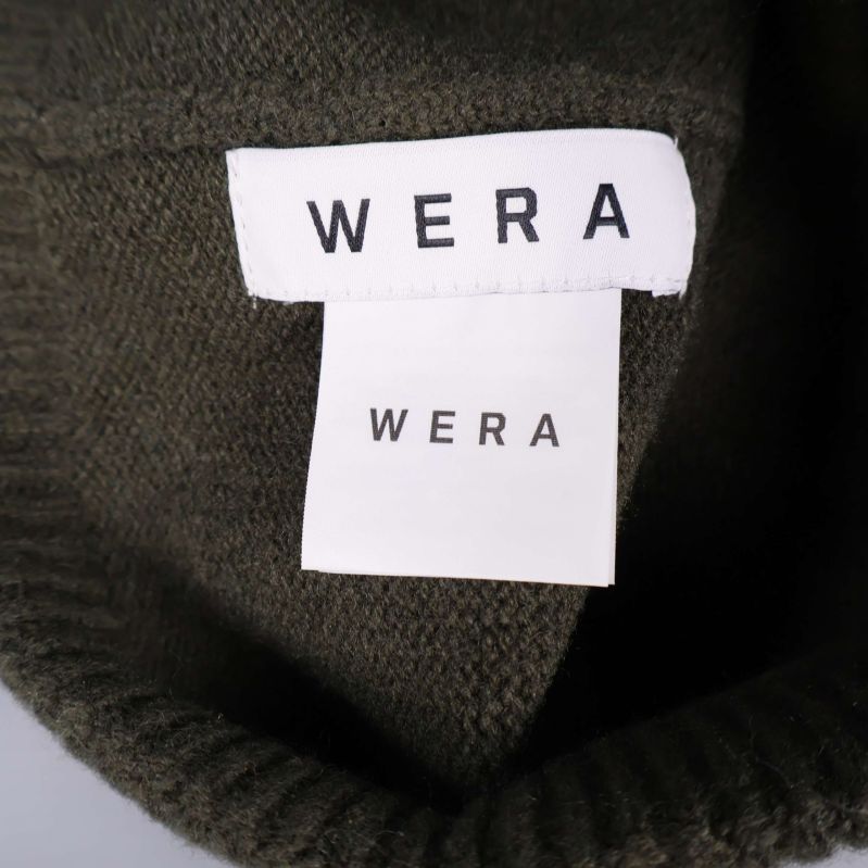 Två innerlappar med WERA-logga syns i mössan