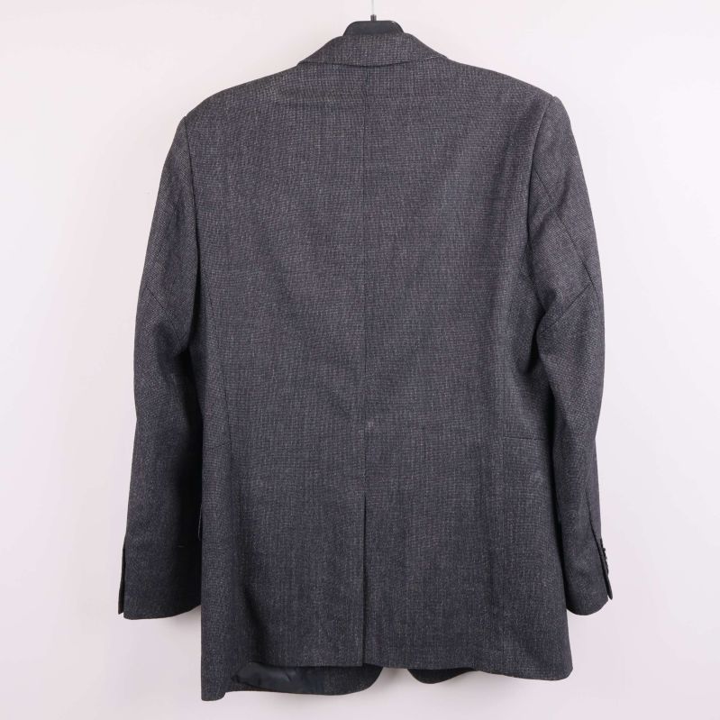 Mörkgrå kavaj på galge från baksidan