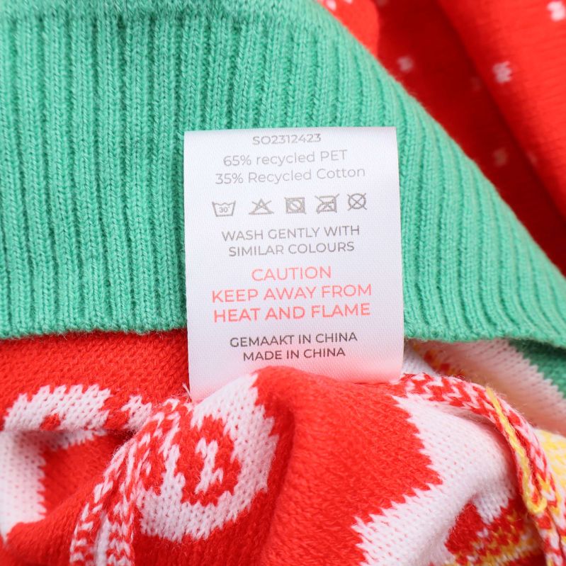 Materialetikett med information om återvunnen PET och bomull