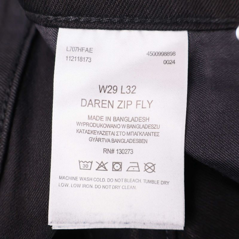 Etikett med storlek och modell W29 L32 Daren Zip Fly