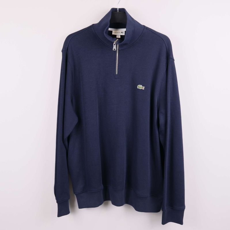 Blå Lacoste-tröja med halv dragkedja och krokodillogo