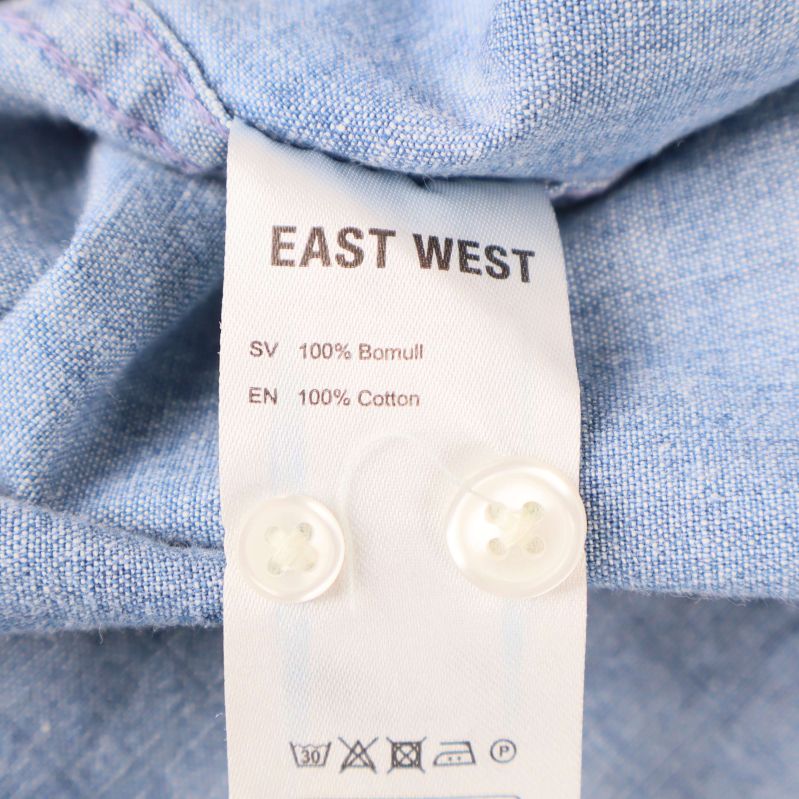 Materiallapp med text 100% bomull och tvättråd