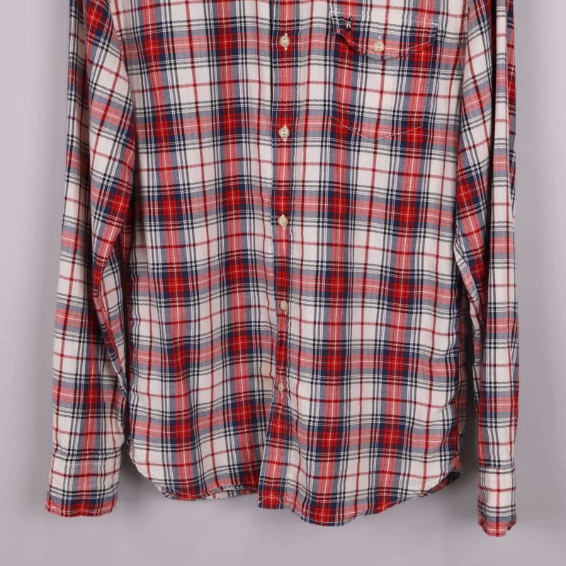 Nederdel med rutigt mönster och knappar