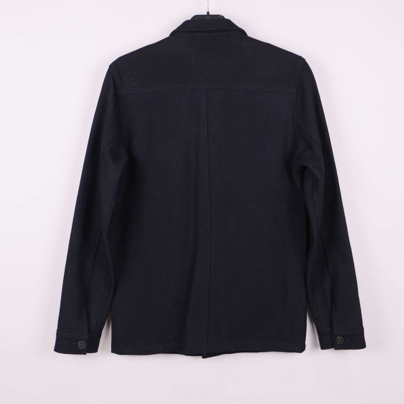 Detalj på ficka och ärm