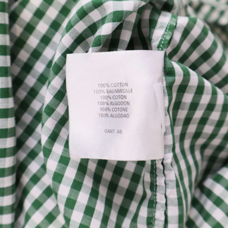 Materialetikett visar 100% bomull