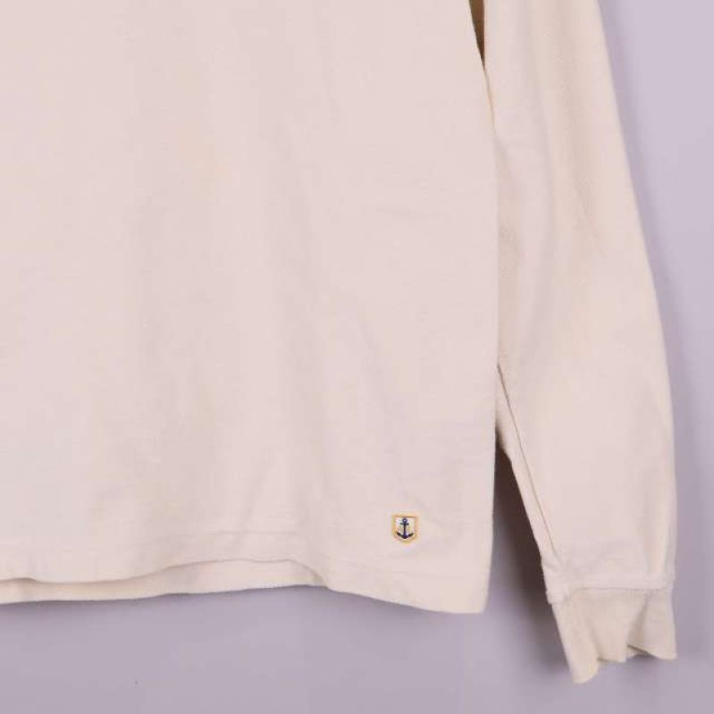 Ärmslut och nederkant detalj