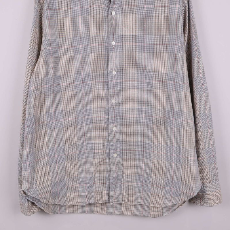 Nitty Gritty etikett i kragen